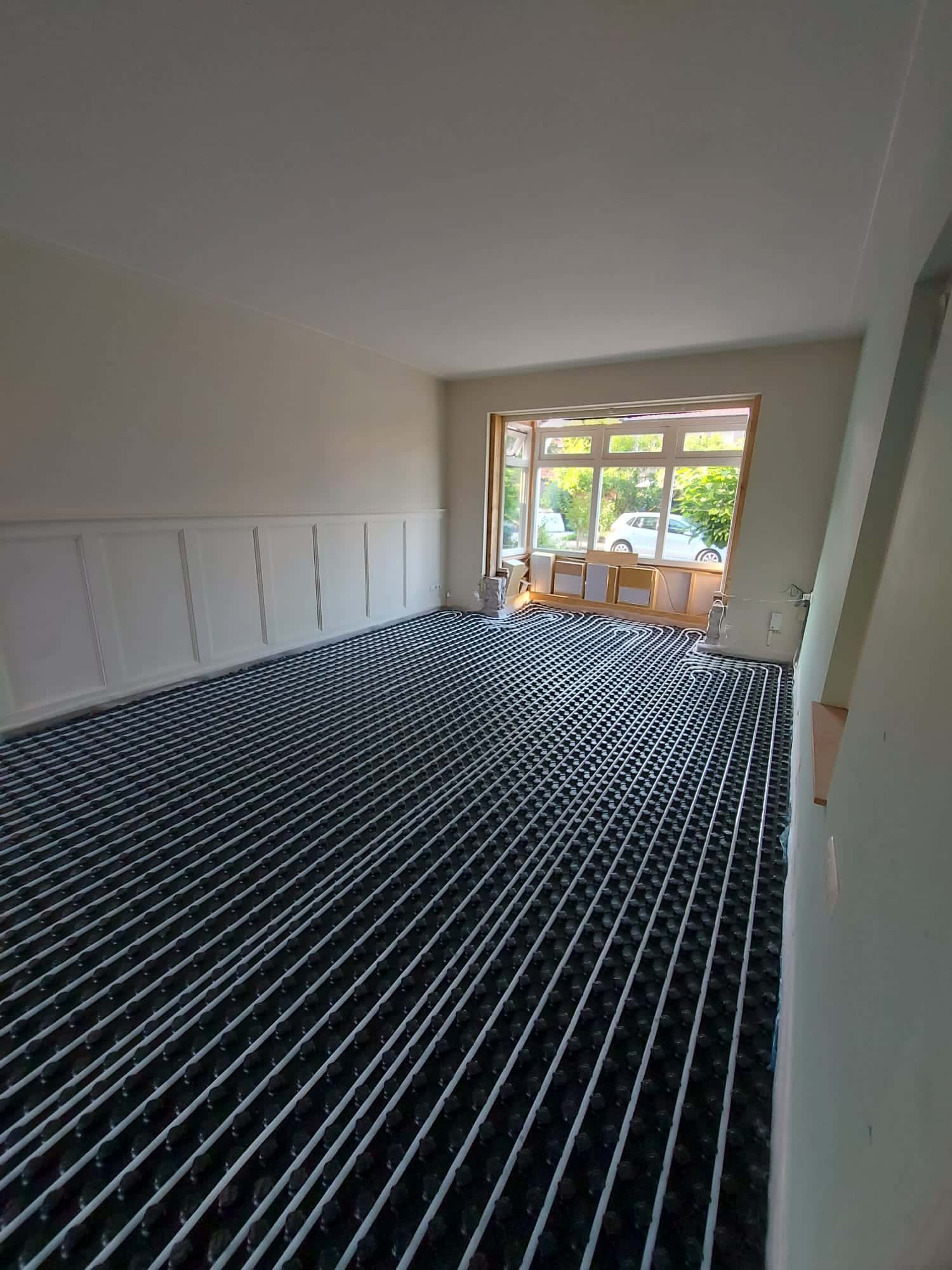 Renovatievloer met vloerverwarming en zandcementdekvloer in Oosterbeek